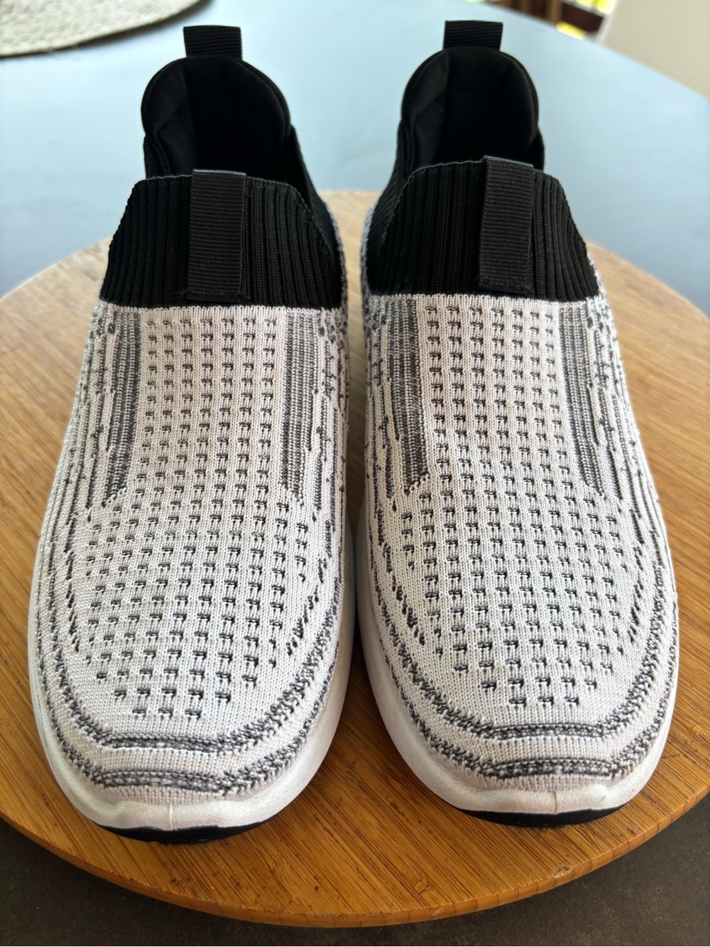 Tommy Bahama Slip-On Knit Athletic Sneakers in White and Black.